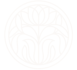 The nourish nurture thrive logo is a circular image depicting sage leaves and a thistle bloom atop a soft teal background.